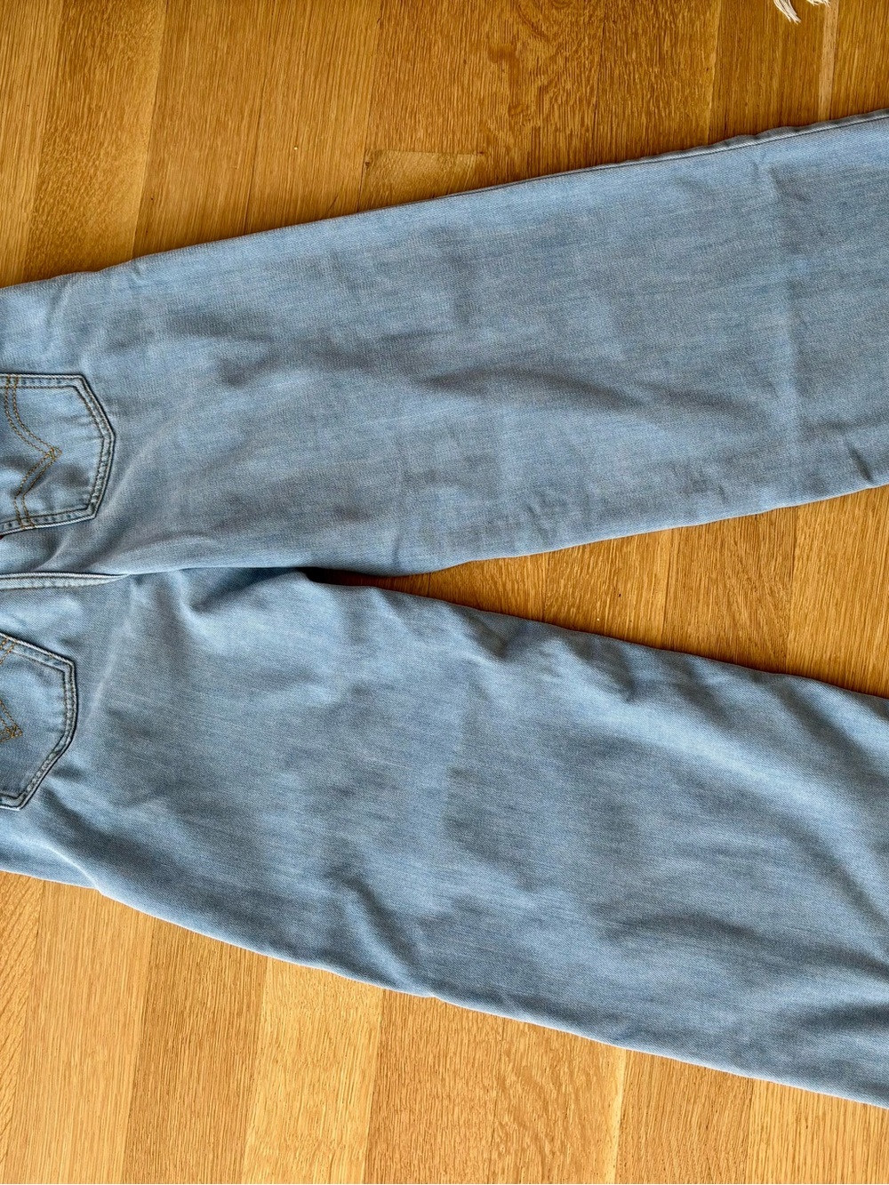 Levi's Light Blue Denim Jeans with Gold Stitching